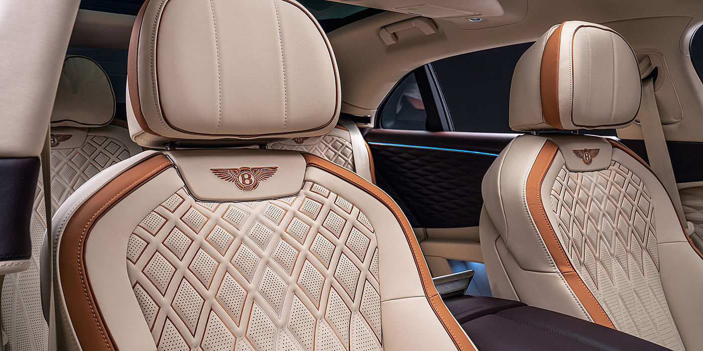 Bentley Newcastle Bentley Flying Spur Odyssean sedan rear seat detail with Diamond quilting and Linen and Burnt Oak hides
