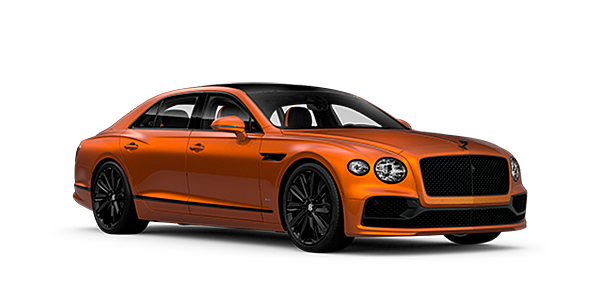 Bentley Newcastle Bentley Flying Spur Speed front side angled view in Orange Flame coloured exterior. 